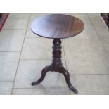 A 19th century mahogany tripod table, 70cm tall x 49cm diameter