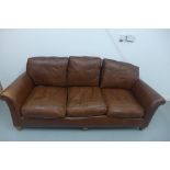 A Parker Knoll three seater Cavendish leather sofa in generally good condition, minor wear to