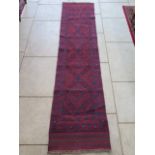 A hand knotted Meshani runner - 256cm x 61cm