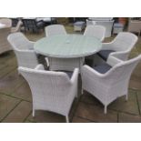 A Bramblecrest Tetbury 135cm round table with chairs, ex-display