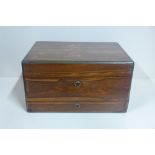 A 19th century rosewood jewellery travel box with brass fittings and Bramah locks, 18cm tall x