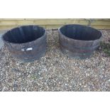 A pair of whisky barrel planters, diameter 72cm, height 38cm