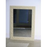 A cream and gilt modern mirror - 78cm x 108cm