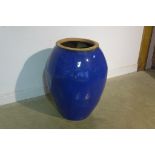 A large blue gazed pot, 87cm H x 67cm