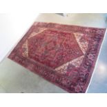 A hand knotted woollen Hariz rug - 295cm x 204cm