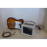 A Squire Fender Telecaster electric guitar and a Vox mini 3 G2 amplifier, battery operated, in