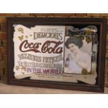 A reproduction coca Cola shop /pub wall mirror, in a wooden frame, in good condition - 74x104 cm