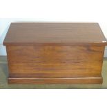 A mahogany or hardwood Victorian style blanket box with strap hinges and iron carrying handles,