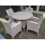 A Bramblecrest Devonshire 110cm round table with four deluxe armchairs, ex-display