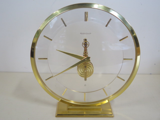 A Jaeger-leCoultre mystery clock with gilt case and baton markers, 19cm tall with original box, - Image 2 of 3