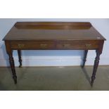 A Victorian mahogany two drawer side table - 81cm tall x 122cm x 55cm - stamped Jas Shoolbred and Co