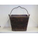 A Chinese wooden square form Well bucket, with a metal handle, 36cm tall, 48cm x 41cm