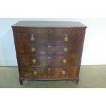 A 19th century mahogany bow fronted chest with two short over three long drawers on splayed