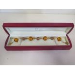 An 18ct yellow gold Murano glass bracelet, 24cm long, approx 38 grams, in very good condition,