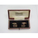 A pair of hallmarked 9ct gold cufflinks in original leather case, weight approx 4.2 grams, condition