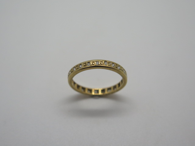 An 18ct gold and white stone eternity ring with a stone missing and rubbing to others, size P, and - Image 3 of 3