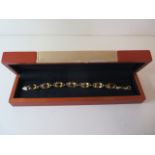 An 18ct yellow gold citrine bracelet 20cm long, set with seven citrines each approx 14x10mm,