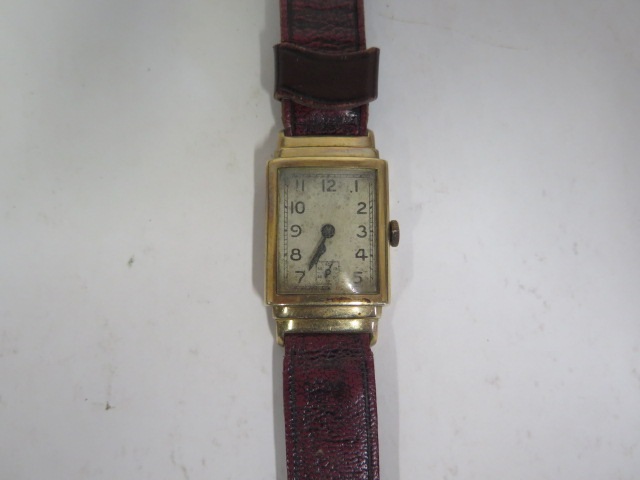 A gents vintage 9ct gold tank watch, Art Deco style case with off white dial, Arabic numerals and - Image 3 of 3
