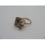 A large 9ct gold and quartz ring, the stone measures approx 17mm x 17mm - ring size O, stamped