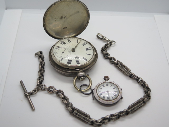 A sterling silver fancy watch chain with silver hunter and fob watch, both not working