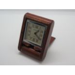 A Jaeger Le Coultre for Cartier travel purse watch/clock in a leather case, no 44316 - 5x4cm,
