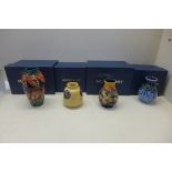 Four small Moorcroft vases, largest 14cm tall, all good with boxes