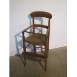 A late Victorian childs beech wood high chair 86cm tall