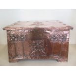 An Arts and Crafts copper coal box, in the style of Archibald Knox, 32cm tall x 53cm x 31cm -