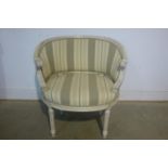 A re-upholstered painted French tub chair, 76cm tall x 74cm wide