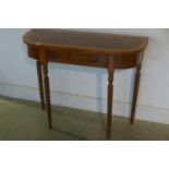 A walnut single drawer side table with herringbone stringing and oak cross banding, standing on