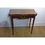 A 19th century fold over top card table with a drawer and turned legs on pad feet - 74cm tall x 75cm