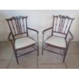 A pair of fine quality mahogany inlaid late Victorian armchairs, bearing a Jas Shoolbred and Co