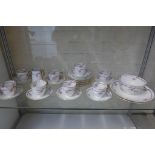 A Count China eight setting teaset with extra tea plate, milk and sugar and two sandwich plates