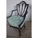 A Shereton style decorated elbow chair with button seat