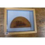 A half model of sailing ship with label verso in a wooden frame 28x33cm