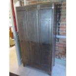 An early 20th century steel locker with shelves and hanging space, 175cm high x 91cm wide