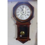 An 8 day American wall clock with striking movement on gong - 87cm tall