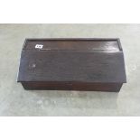 A small oak box with sloping front, 15cm tall x 44cm x 21cm