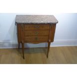 A continental three drawer marble top chest with tumbling block veneers, 75cm tall x 69cm x 36cm