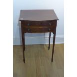 An Edwardian mahogany bow fronted two drawer side table, 72cm tall x 49cm x 40cm