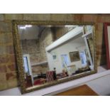 A mirror with beveled edge - 82cm wide x 58cm high
