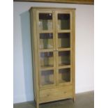 An ex-display Nordic oak display cabinet - 87cm W x 37cm D x 193cm H