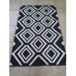 A hand knotted Old tribal wool Kilim rug - 187cm x 118cm