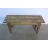 A rustic bench 102cm long