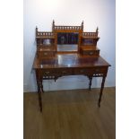 A good quality late Victorian Maple and Co walnut mirror back writing desk with two small and two