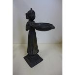 An Eastern bronze figural oil lamp, 19cm tall, no obvious damage, good patination