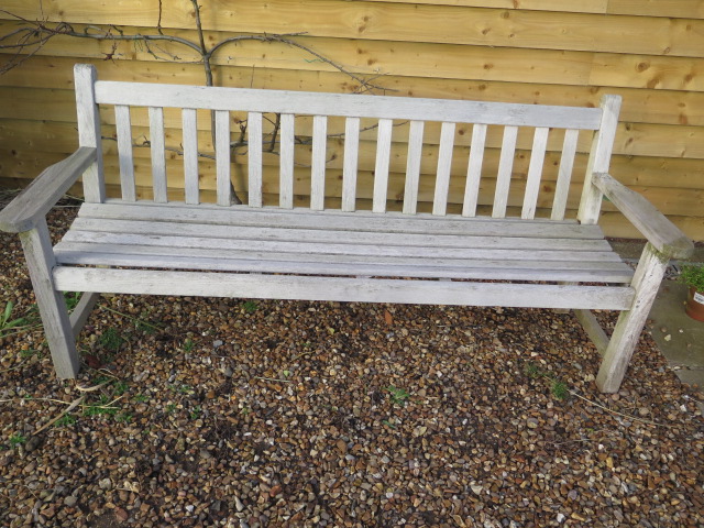 A good quality teak garden bench, 190cm wide