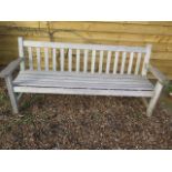 A good quality teak garden bench, 190cm wide