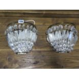 A pair of cut glass wall lights