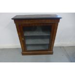 A Victorian walnut ormulu mounted cabinet with a single glazed door, 88cm tall x 76cm x 25cm